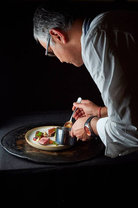 Chef plating food